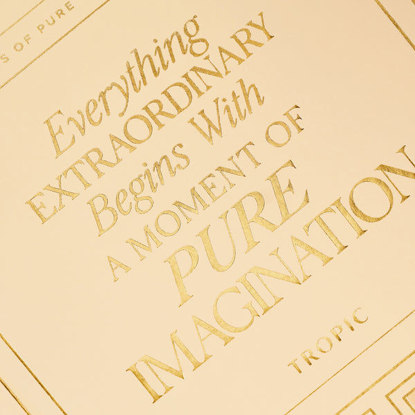 Close-up of Tropic advent calendar gold foil quote reading 