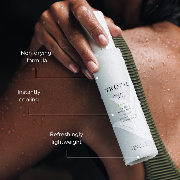 Tropic Morning Mist soothing toning essence held against dewy skin with callouts highlighting non-drying formula, instantly cooling and refreshingly lightweight.