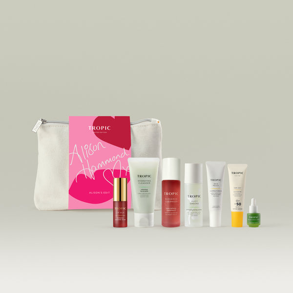 Alison’s Edit displayed with a branded cosmetics bag, exclusive edit card, and seven Tropic skincare products arranged on a neutral background.