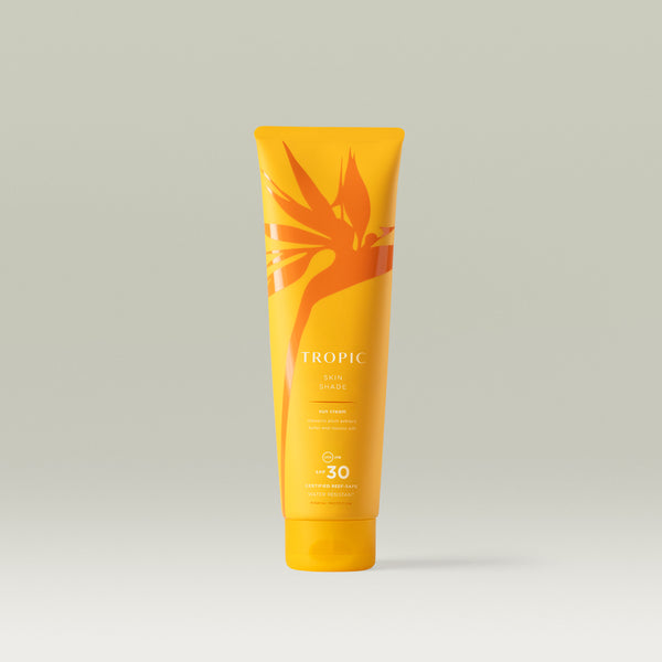 Tropic Skin Shade sun cream SPF 30. Yellow tube with orange leaf design. It's certified reef safe and water resistant. 
