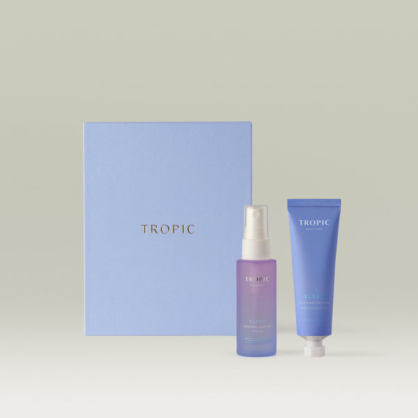 Tropic The Dream Team Collection with Sleep Evening Unwind pillow mist and hand balm in a purple gift box.